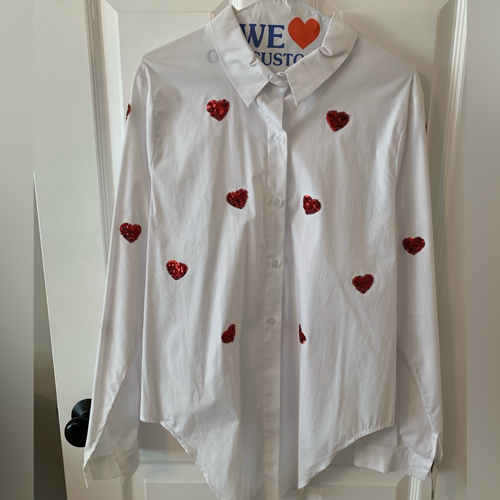 white button-down with red sequined hearts.